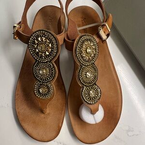 Never worn summer sandals in a 41 (fits like a size 10 in US.